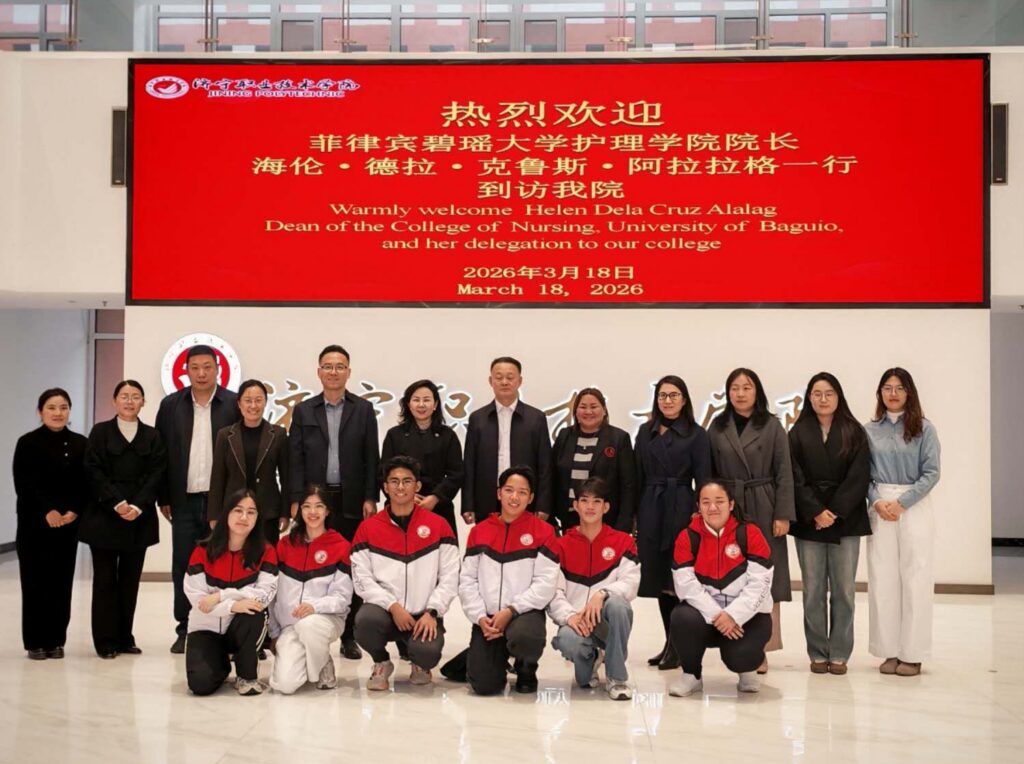 The UB delegates and the welcoming officiants posing for a group photo during the meeting on the tripartite partnership.